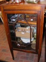 An Edwardian display cabinet