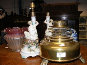 A pair of continental porcelain table lamps, toget