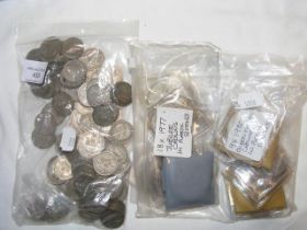 A selection of 1 shilling coins and commemorative