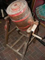 Vintage butter churn on stand