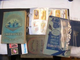 Various collectable cigarette cards, coins, stamps