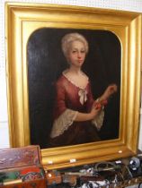 An antique oil on canvas portrait of lady holding