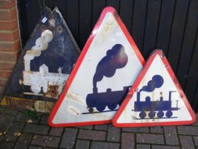 Three triangular enamel railway signs