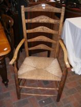 An antique ladderback armchair
