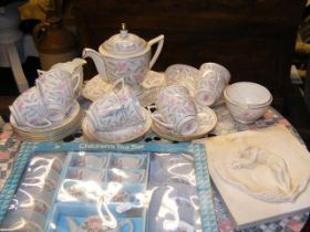 A quantity of Minton's 'Petunia' pattern tea ware,