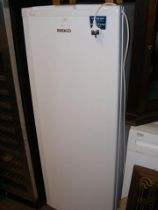A Beko upright fridge
