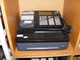A Casio electronic cash register