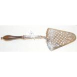 A George III silver fish slice with turned wooden