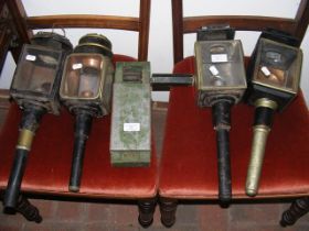 Four coaching lamps, together with an antique clac