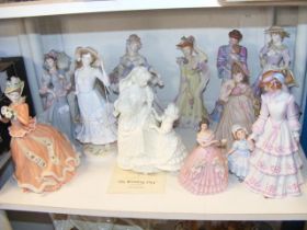 A quantity of female figurines, including Royal Do
