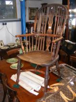 A 19th century stick back country armchair with cr