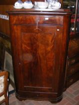 An antique mahogany corner cupboard - 94cms