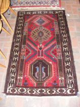 A Middle Eastern rug with geometric border - 150cm