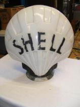 A vintage glass Shell advertising globe - 45cms hi