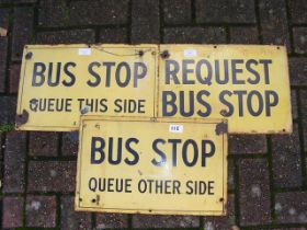 Three old enamel bus stop signs