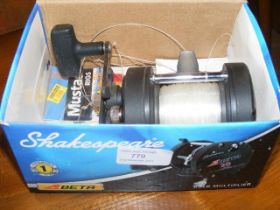 A Shakespeare fishing reel in box