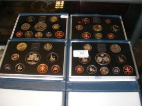 Four commemorative coin sets 1995, 1996, 1997, 199