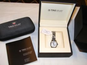 A ladies Tag Heuer wrist watch with date aperture,