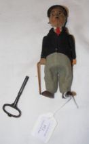 An antique German clockwork Charlie Chaplin