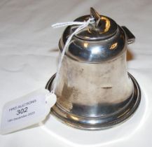 A silver capstan inkwell