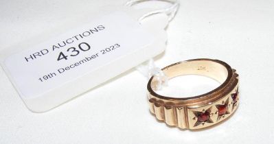 A 9ct gold ring with red stone mount
