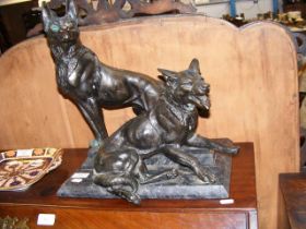 A Spelter figural statue of two German Shepherd dogs