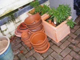 A pair of terracotta planters, together with assor