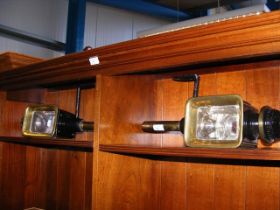 A pair of antique coach lights