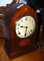 An Edwardian lancet shaped mantel clock by Gilbert