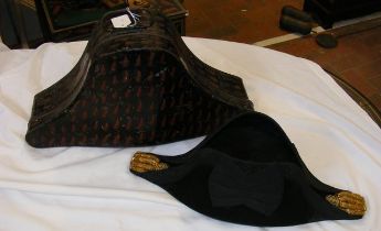 A Naval tricorn hat - contained in original tin in