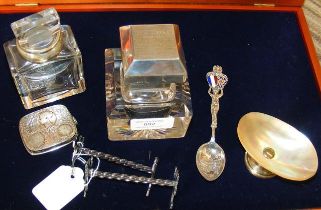A silver mounted inkwell, coin holder etc.