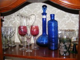 A quantity of coloured and decorated vintage glass