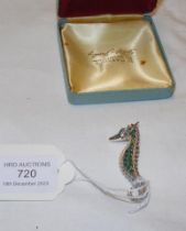 A silver and emerald seahorse brooch/pendant