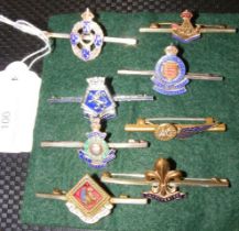 Various military and other pins, including HMS St.