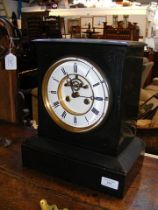 A Victorian eight day slate mantel clock