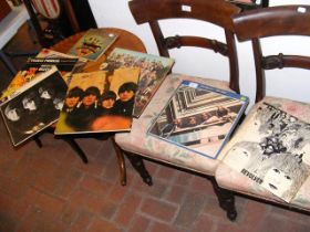 A selection of vintage Beatles albums, together wi