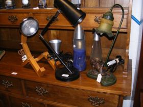 A quantity of lamps, including lava lamps