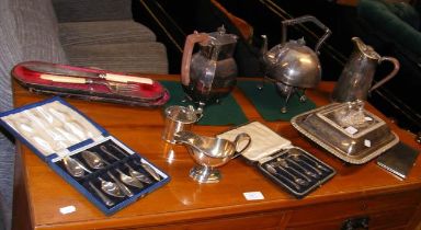 A cased set of six silver teaspoons, together with