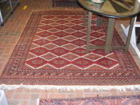 A Middle Eastern rug with geometric border - 270cm