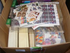 A box of stamps - loose and in albums