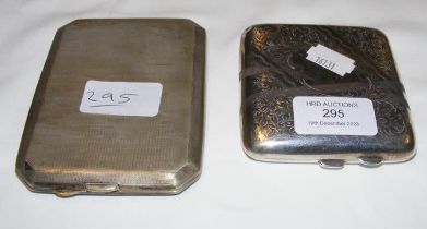 A silver cigarette case and one other