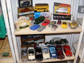 A quantity of die cast model vehicles, including C