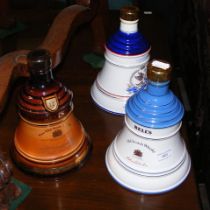 Three unopened Bell's Scotch Whiskey decanters