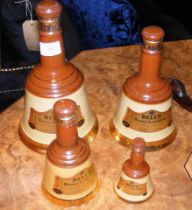 A graduated set of four unopened Bell's Scotch Whi