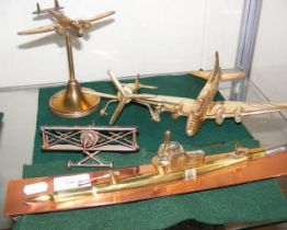 Four assorted Trench Art model aeroplanes, togethe