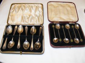 A cased set of six silver teaspoons and one other