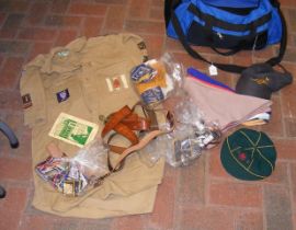 A vintage scout shirt, belts, badges, scarves etc.