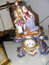 A decorative French porcelain mantel clock - the e