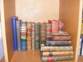 A medley of antique books including 'A Ride to Khi