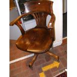 An antique swivel office chair